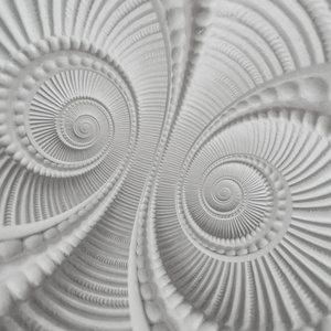 白色灰泥成型抹灰元素双螺旋抽象的分形图案背景。石膏抽象螺旋效果背景。白色螺旋抽象背景。灰泥装饰概念