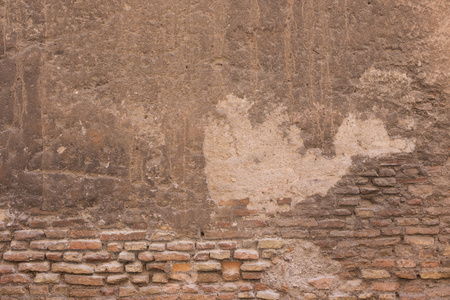 从石头在罗马古董斑驳的墙