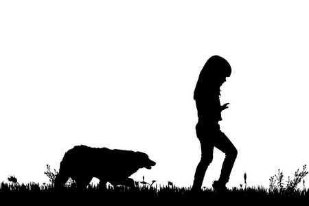 一个孩子和一条狗的轮廓