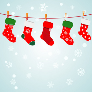 圣诞节背景与袜子挂在一根绳子上