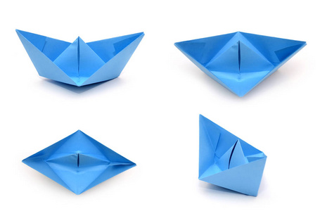 组的蓝色折纸纸船。纸模运输