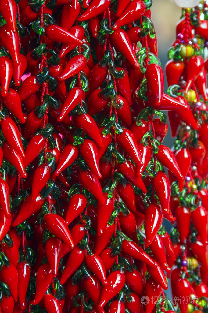 红热的泰国辣椒纪念品从玻璃泰国玻红辣椒的背景下香港