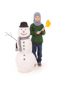 可爱的男孩，与雪人围巾和帽子