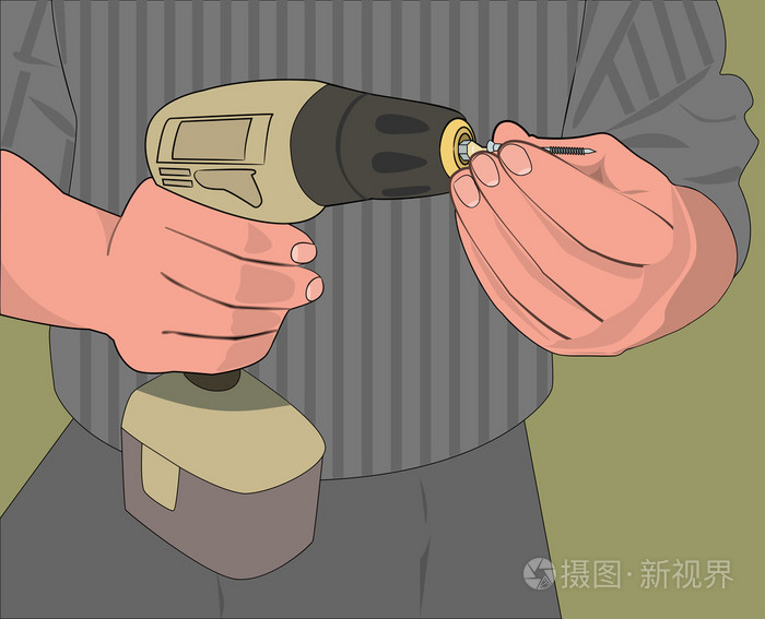 一个人在他手中的电动螺丝刀