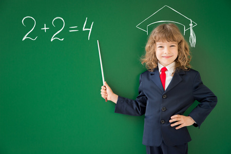 School kid with mathematic task