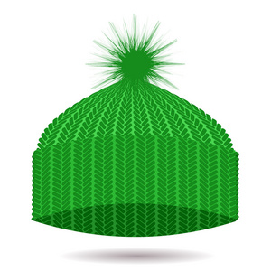 绿色的针织的帽。冬天的帽子