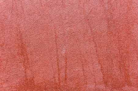 外墙用红色彩色华丽石膏，纹理的特写