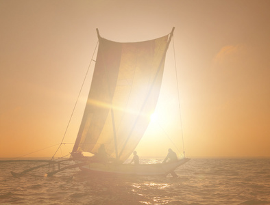 pcheurs sur catamaran au coucher du soleil