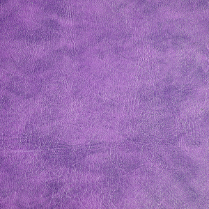 紫色皮革纹理背景的特写