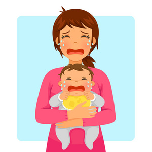 女人抱孩子哭泣的图片图片