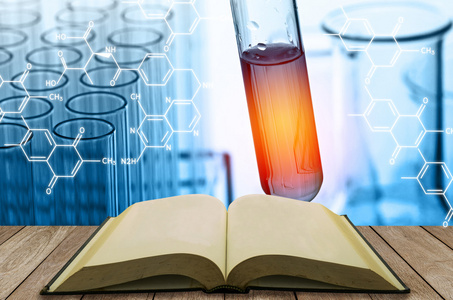科学实验室试管背景空白本打开的书照片