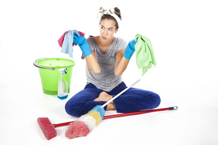 筋疲力尽累的筋疲力尽的清洁女工照片