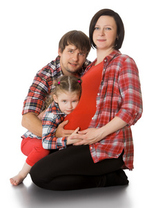 怀孕的妇女和她的家人