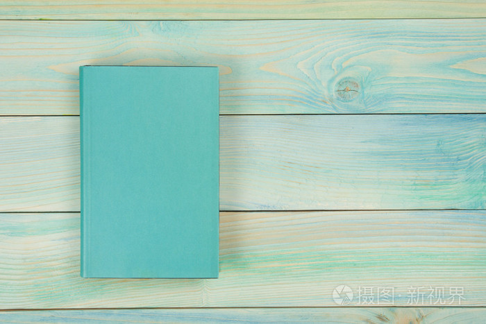 空白的书的封面上带纹理的木材背景.复制空间