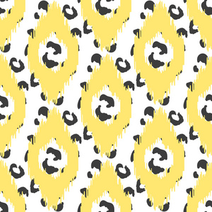 Ikat 矢量无缝模式。抽象的几何背景为织物 打印或包装纸。豹皮和黄色