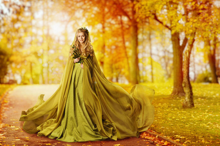 树模型秋天的女人,时尚模型室外肖像,秋天穿裙子,黄色秋天树叶公园的