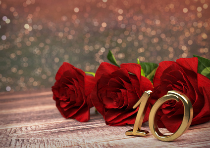 生日概念与红色玫瑰木桌上。第十届。10.3d 渲染