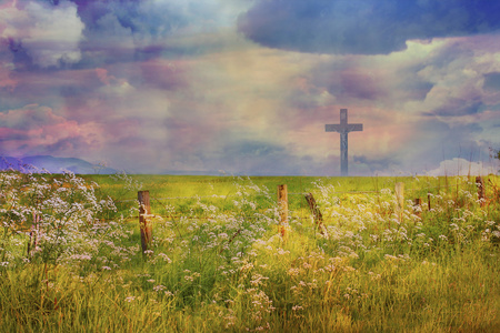 耶稣基督的十字架和美丽的云彩背景与花卉装饰的十字架洗礼基督徒十字