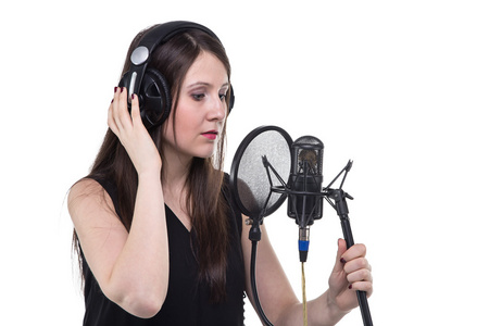 耳机的年轻女子,声乐录音照片