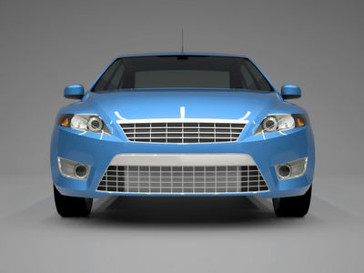 汽车前视图.蓝色汽车带有灰色背景的形象照片