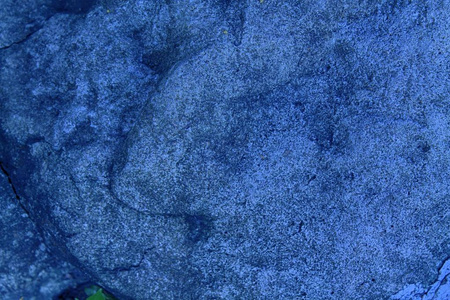 蓝色石头纹理或岩石表面背景为网站或移动设备照片