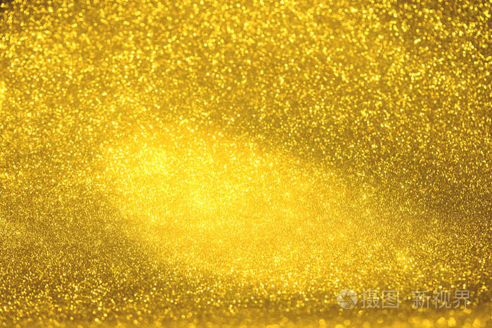 金色闪光纹理创模糊的抽象背景为生日,周年纪念日,婚礼,新年前夕或