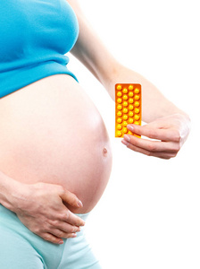孕妇在怀孕的药物, 胶囊或补充剂, 维生素在怀孕的概念