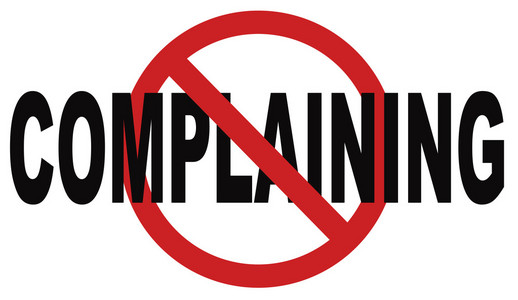 停止抱怨的标志照片