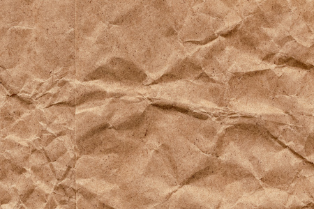 棕色回收牛皮纸纸包皱的 Grunge 纹理样本