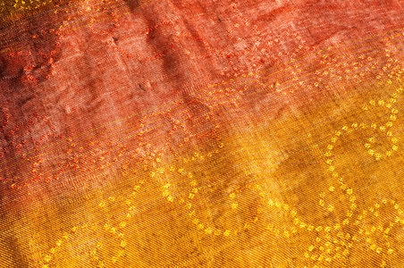 羊毛织物黄色红色金色的纹理