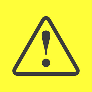 感叹号的危险在黄色背景上签名照片