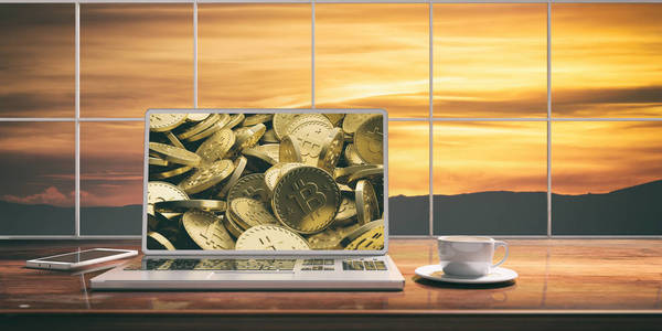 比特币屏幕放在桌子上的笔记本电脑。模糊的日落背景。3d 图