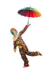 小丑与孤立在白色的伞