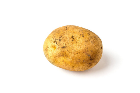 一个肮脏的土豆在白色背景特写照片