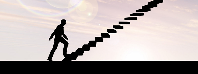 在楼梯上的商人图片