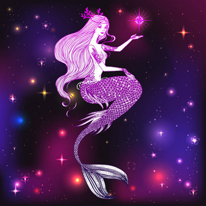 美丽的美人鱼与明星在她的手照片