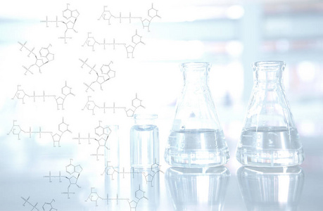 与瓶和玻璃瓶的背景，在科学实验室的化学结构