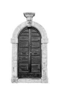 一座意大利老房子的入口木门黑色和白色