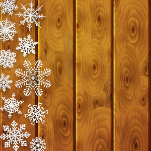 在木板上的纸雪花圣诞节背景
