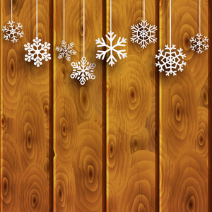 圣诞节背景与挂在木板上的雪花