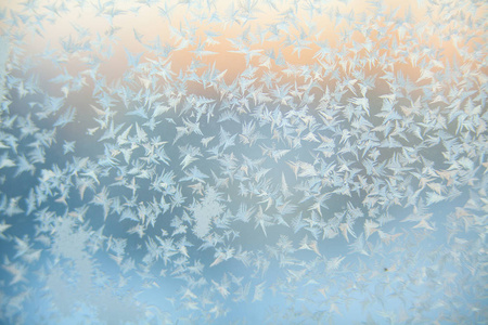 美丽的冬天纹理图案的窗口上的霜
