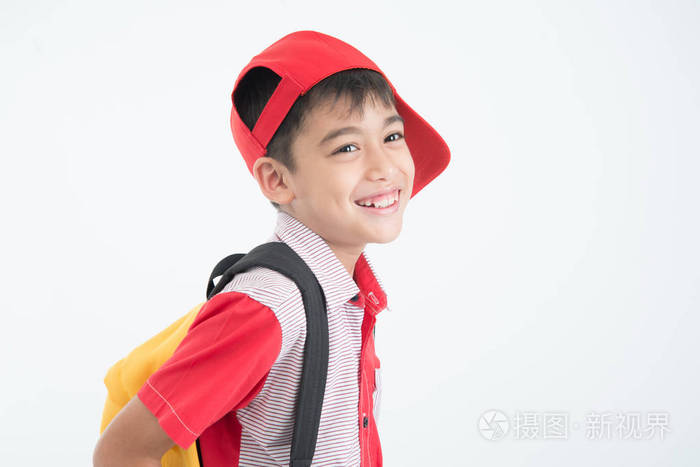 小男孩的肖像去学校与书包在白色背景下