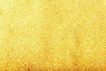 金色闪光纹理创模糊的抽象背景为生日,周年纪念日,婚礼,新年前夕或