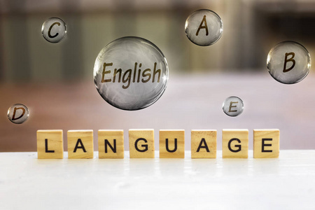 学习哦啊语言木字母和德国飞行气泡, 学习英语概念照片