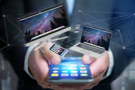 从连接网络上看智能手机,平板电脑和计算机等设备照片