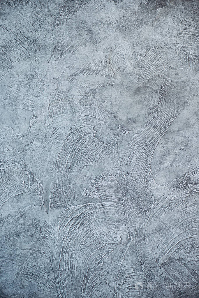 膨体的灰色腻子.复古又脏又臭的或背景威尼斯灰泥纹理作为模式墙