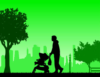 父亲与他的孩子在婴儿小推车在公园里散步
