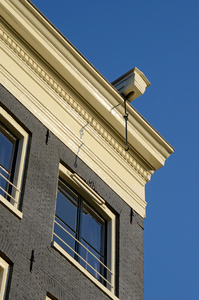 带钩吊装在阿姆斯特丹，Neth 房子的屋顶