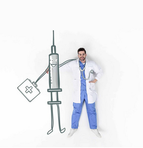 年轻英俊的医生创造性的拼贴画拥抱与微笑注射器字符举行医疗案件