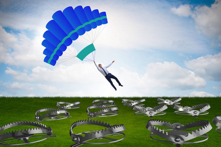 商人落入降落伞陷阱照片